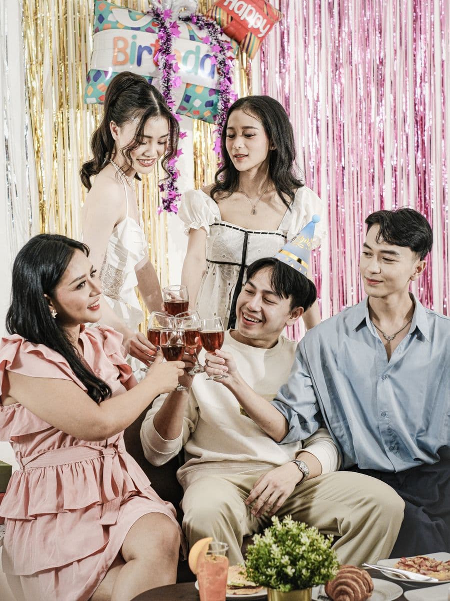 Friends toasting at a birthday party